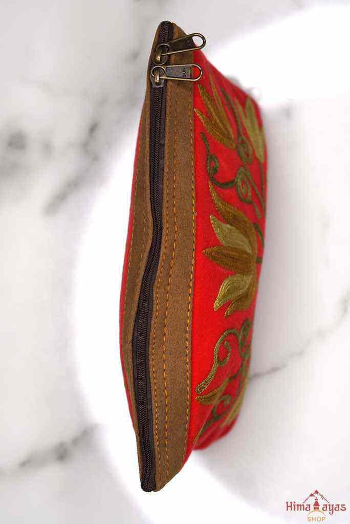 Beautiful Cashmere design pouch made with hand-embroidery design with a very fine embellishment that involves elaborate and intricate floral motifs. 