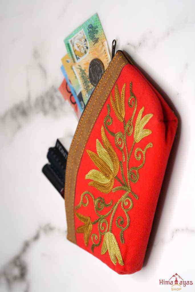 Beautiful Cashmere design pouch made with hand-embroidery design with a very fine embellishment that involves elaborate and intricate floral motifs. 