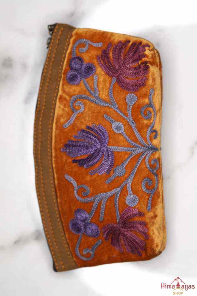 Premium quality women pouch made from ultra soft and lightweight material, this pouch has a soft velvet touch.