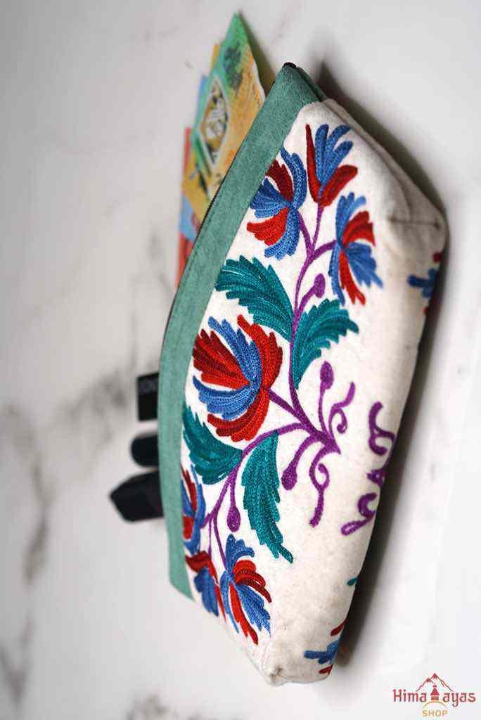 A perfect travel pouch for women that is light weight and can fit in any bag or even you can use it as the perfect clutch that suit your style. 