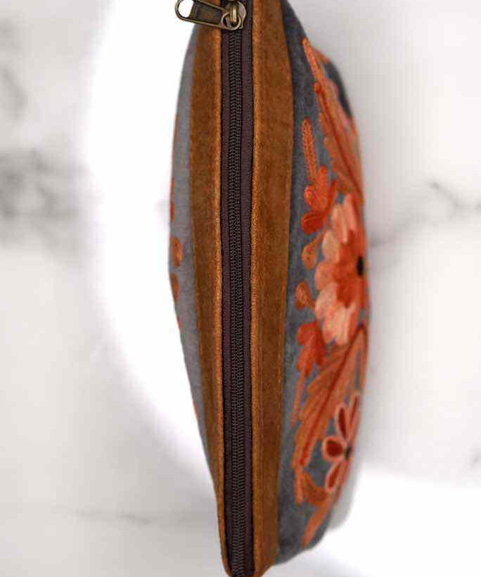 Beautiful Cashmere design pouch made with hand-embroidery design with a very fine embellishment that involves elaborate and intricate floral motifs. 