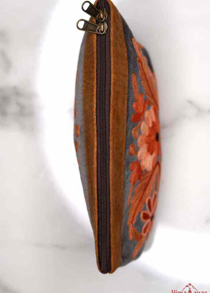 Beautiful Cashmere design pouch made with hand-embroidery design with a very fine embellishment that involves elaborate and intricate floral motifs. 