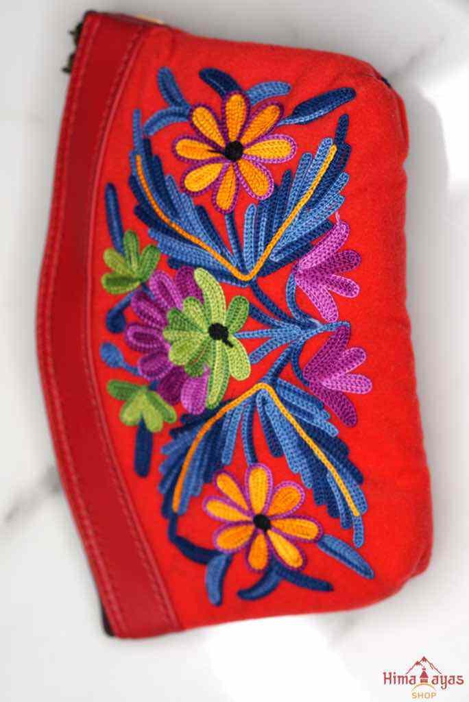 Beautiful Cashmere design pouch made with hand-embroidery design with a very fine embellishment that involves elaborate and intricate floral motifs. 