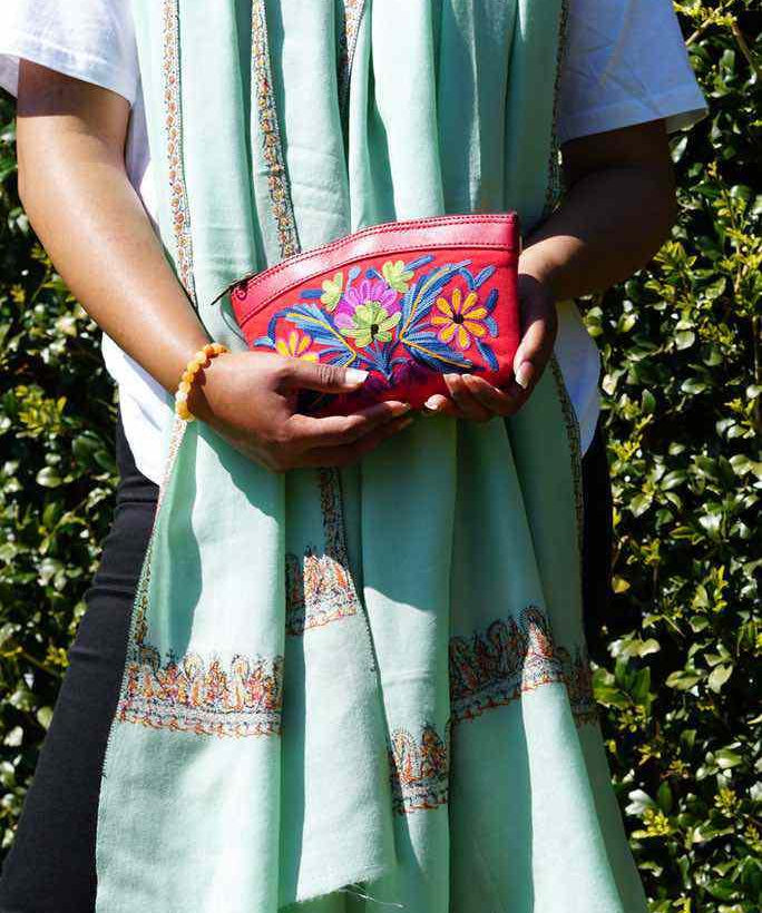 Beautiful Cashmere design pouch made with hand-embroidery design with a very fine embellishment that involves elaborate and intricate floral motifs. 