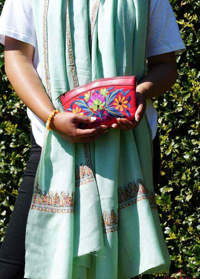 Beautiful Cashmere design pouch made with hand-embroidery design with a very fine embellishment that involves elaborate and intricate floral motifs. 