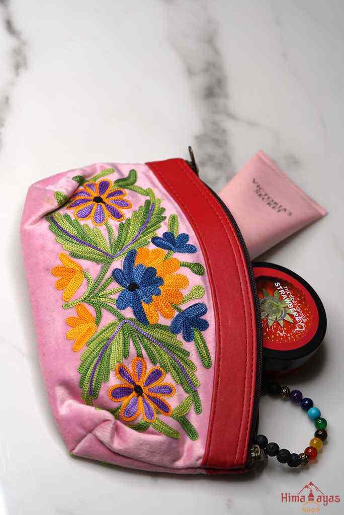 Beautiful Cashmere design pouch made with hand-embroidery design with a very fine embellishment that involves elaborate and intricate floral motifs. 