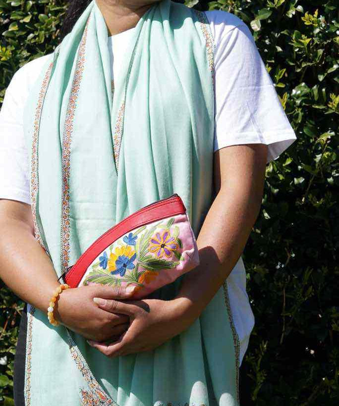 Beautiful Cashmere design pouch made with hand-embroidery design with a very fine embellishment that involves elaborate and intricate floral motifs. 