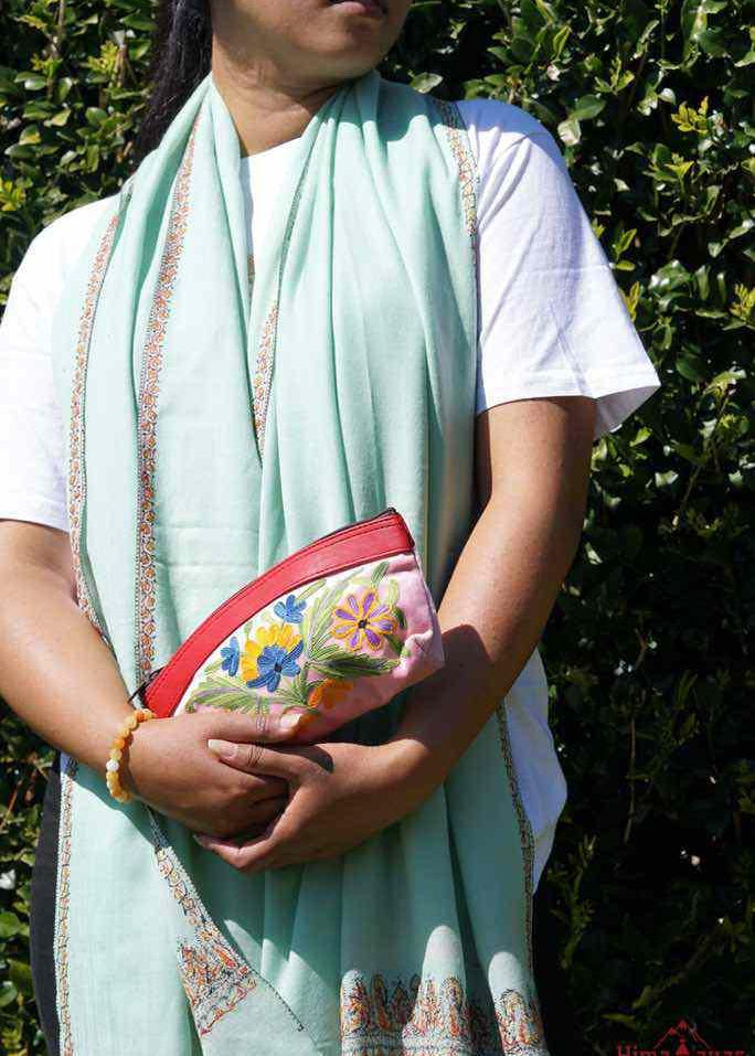 Beautiful Cashmere design pouch made with hand-embroidery design with a very fine embellishment that involves elaborate and intricate floral motifs. 