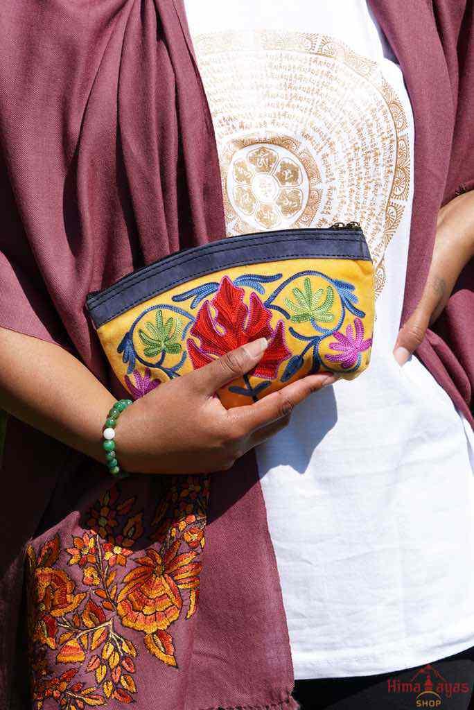 A special women pouch very light weight, ideal as a makeup bag or everyday use hand purse.