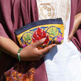 A special women pouch very light weight, ideal as a makeup bag or everyday use hand purse.