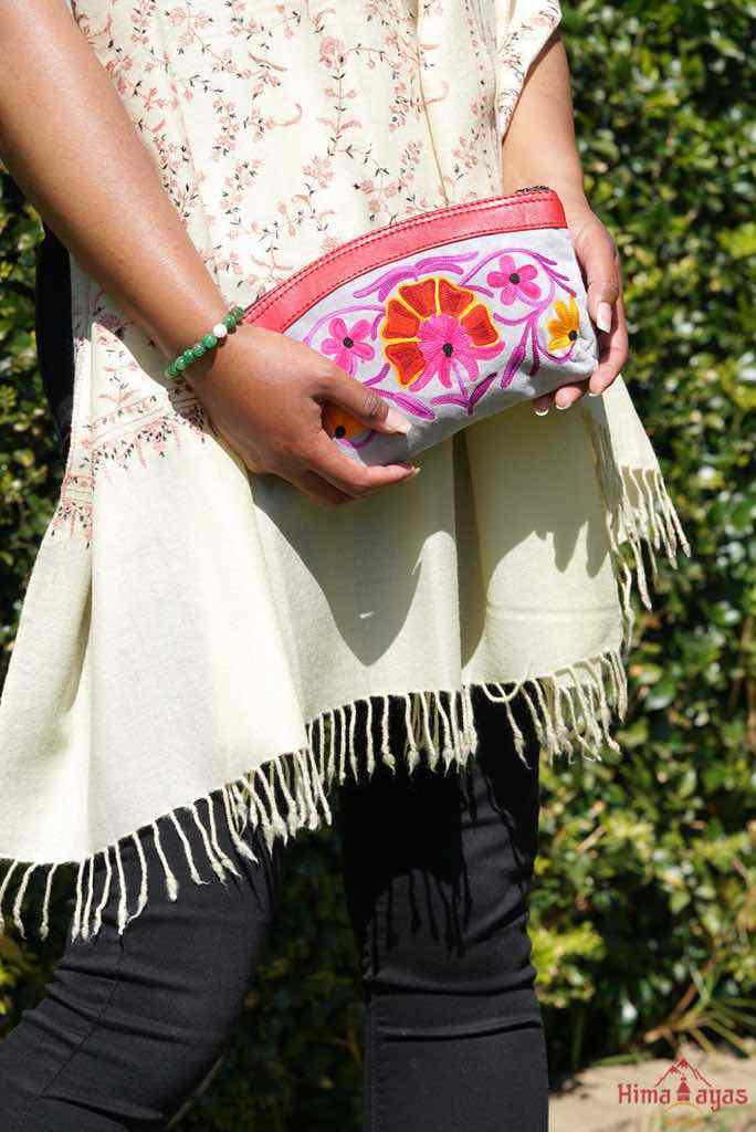 Women pouch purse with floral pattern, ultra-soft and lightweight. The pouch can be used as makeup bag or clutch that suit your style. Ethically made in Nepal.