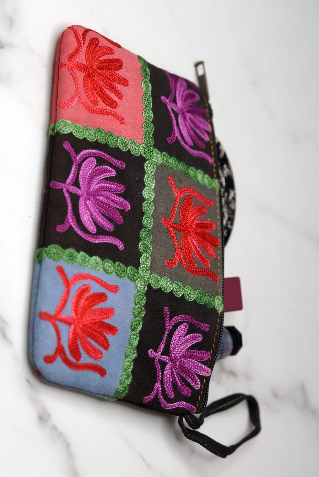 A stylist wristlet women purse for everyday use, handmade and kashmiri embroidery design for boho style. 