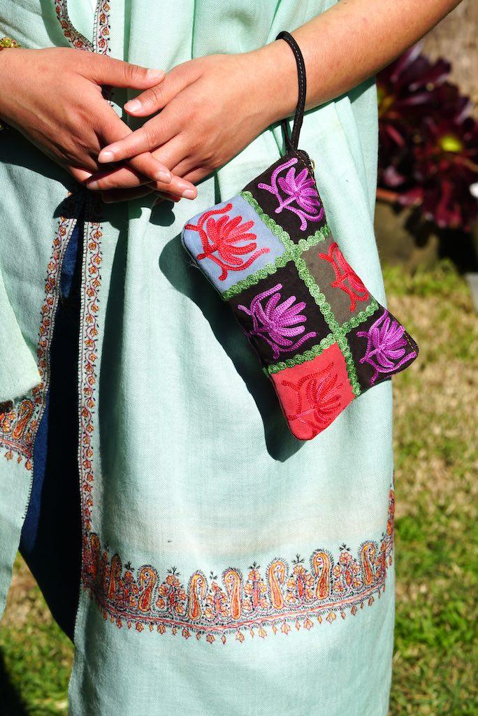 A stylist wristlet women purse for everyday use, handmade and kashmiri embroidery design for boho style. 