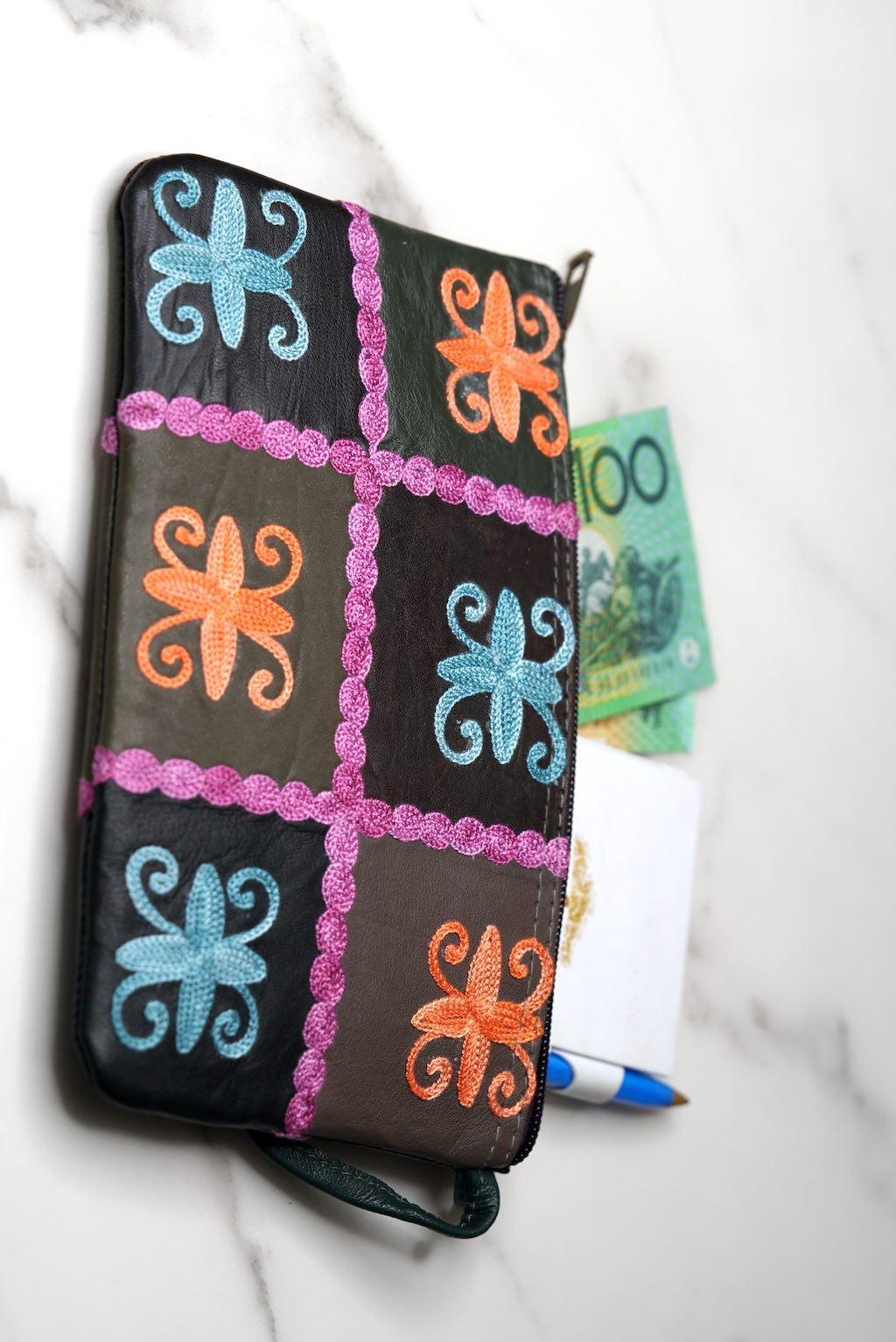 Everyday use women purse with Cashmere design for stylish look.  
