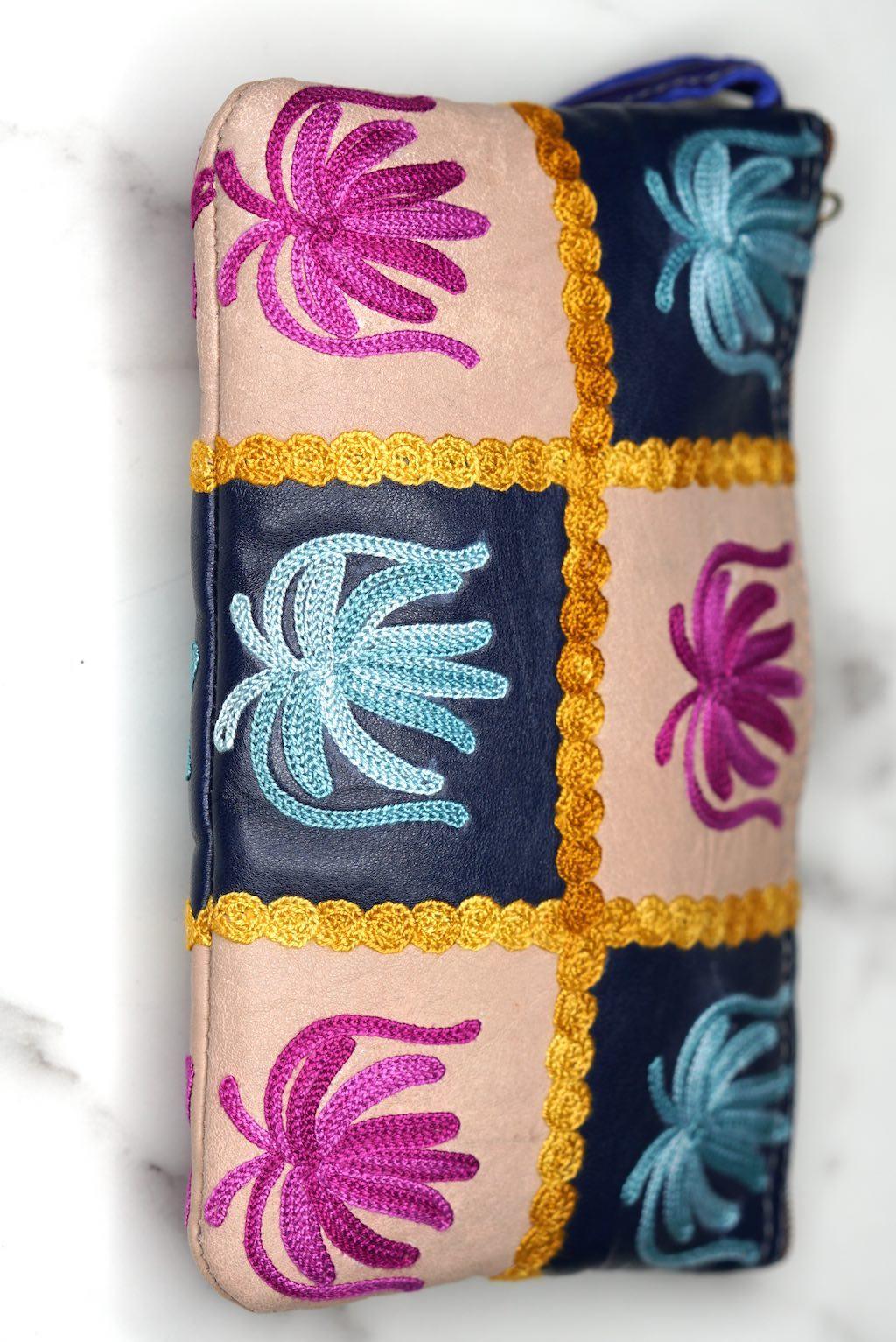 A stylist wristlet women purse for everyday use, handmade and kashmiri embroidery design for boho style. 