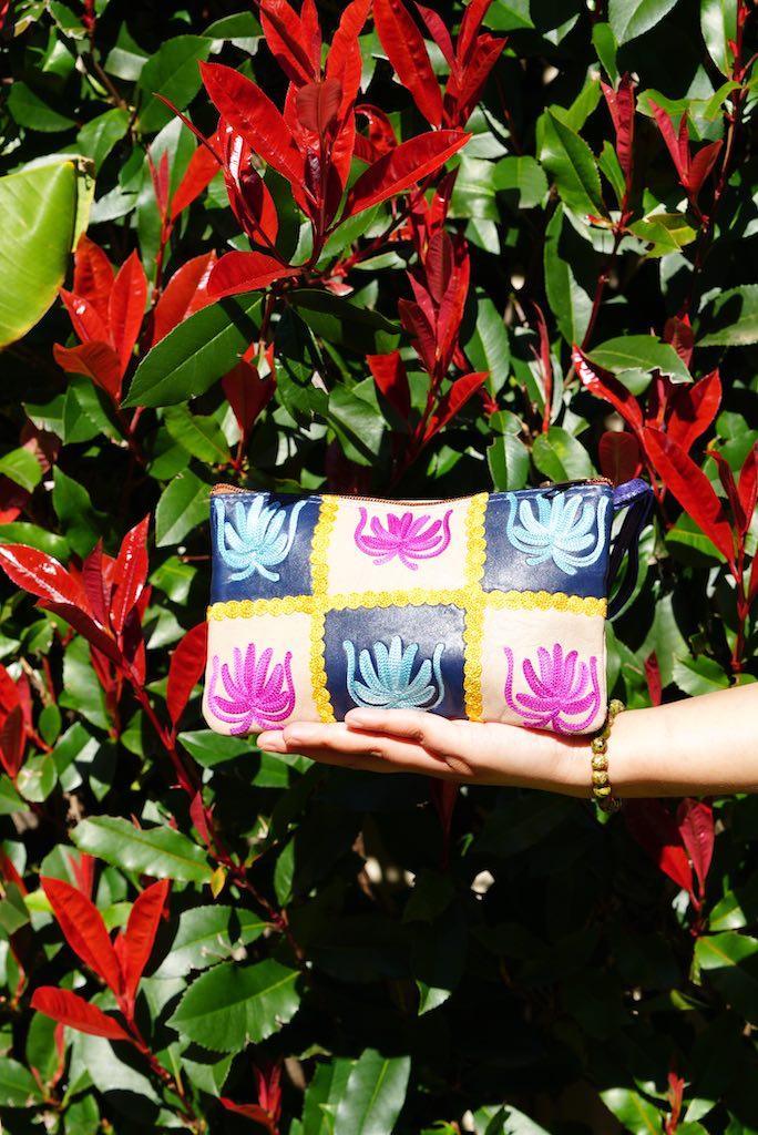 A stylist wristlet women purse for everyday use, handmade and kashmiri embroidery design for boho style. 