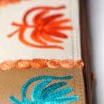 A stylist wristlet women purse for everyday use, handmade and kashmiri embroidery design for boho style. 
