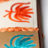 A stylist wristlet women purse for everyday use, handmade and kashmiri embroidery design for boho style. 