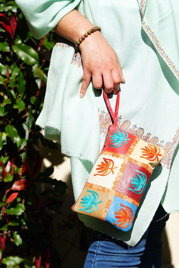 A stylist wristlet women purse for everyday use, handmade and kashmiri embroidery design for boho style. 