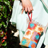 A stylist wristlet women purse for everyday use, handmade and kashmiri embroidery design for boho style. 