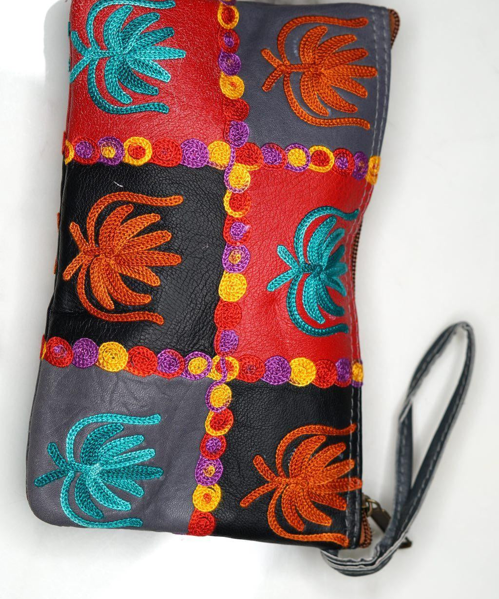 A stylist wristlet women purse for everyday use, handmade and kashmiri embroidery design for boho style. 