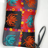 A stylist wristlet women purse for everyday use, handmade and kashmiri embroidery design for boho style. 