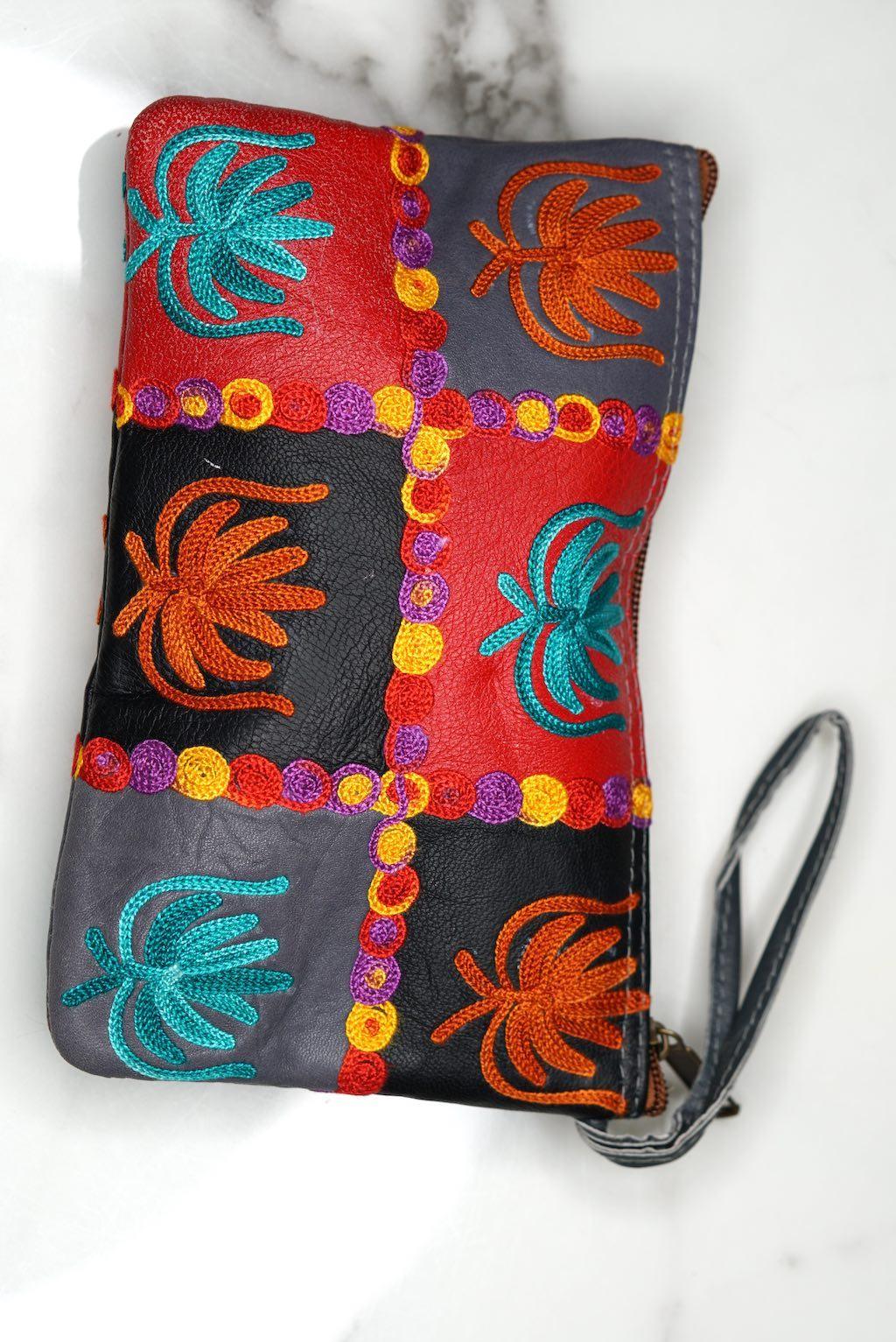 A stylist wristlet women purse for everyday use, handmade and kashmiri embroidery design for boho style. 