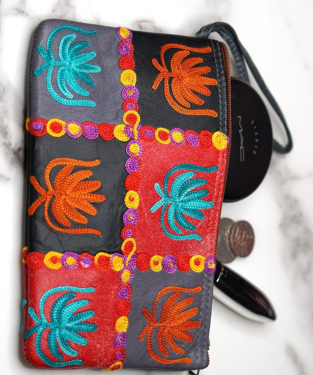 A stylist wristlet women purse for everyday use, handmade and kashmiri embroidery design for boho style. 