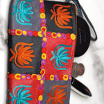 A stylist wristlet women purse for everyday use, handmade and kashmiri embroidery design for boho style. 