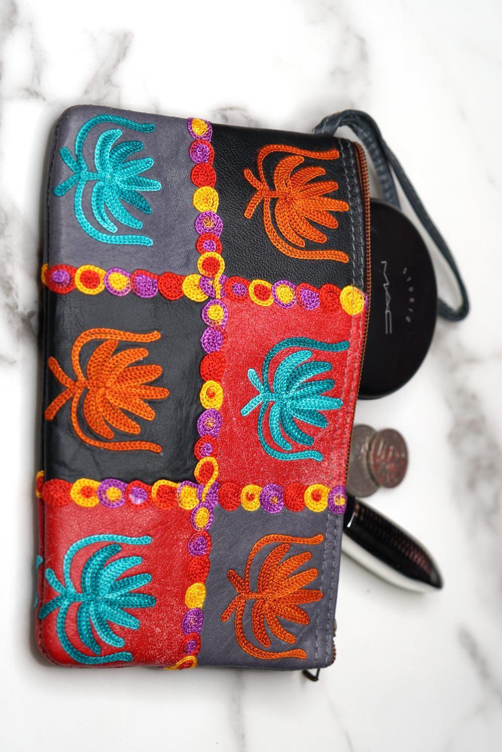 A stylist wristlet women purse for everyday use, handmade and kashmiri embroidery design for boho style. 