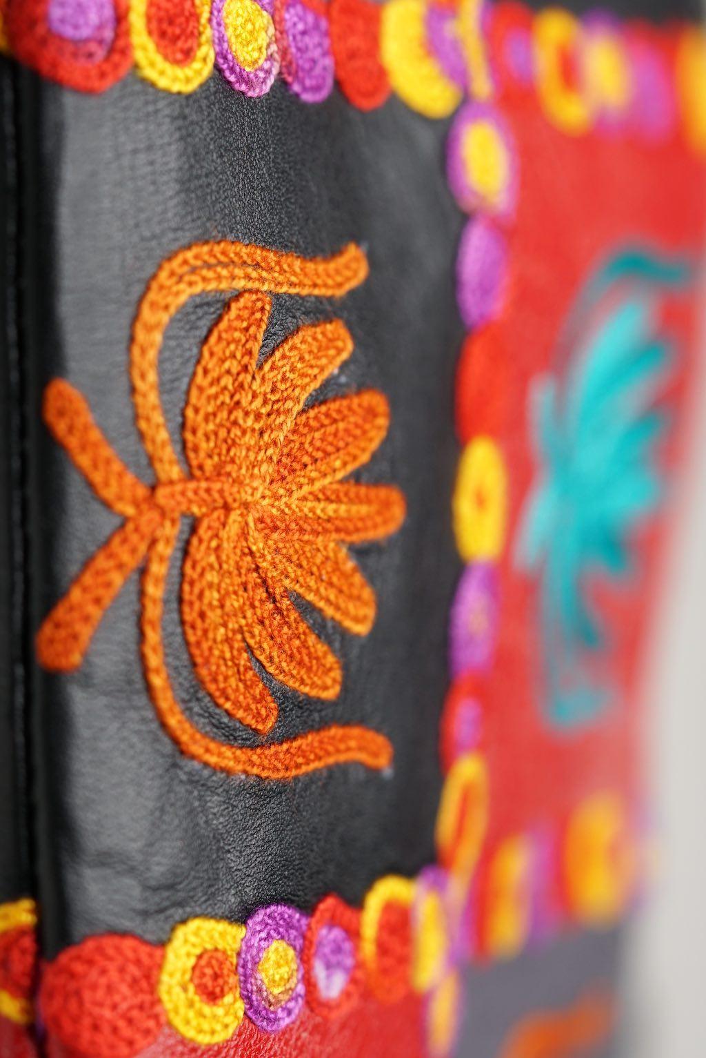 A stylist wristlet women purse for everyday use, handmade and kashmiri embroidery design for boho style. 