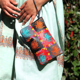 A stylist wristlet women purse for everyday use, handmade and kashmiri embroidery design for boho style. 