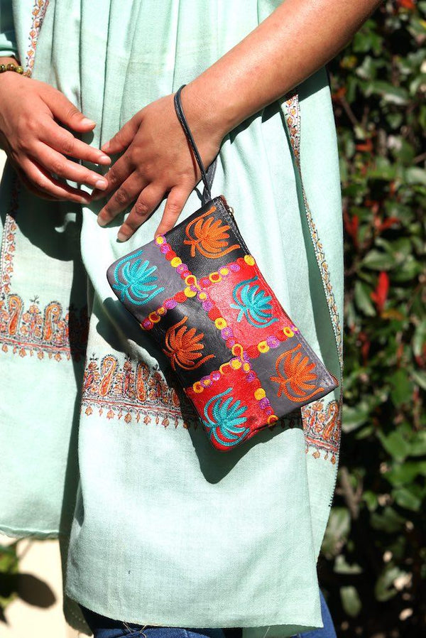 A stylist wristlet women purse for everyday use, handmade and kashmiri embroidery design for boho style. 