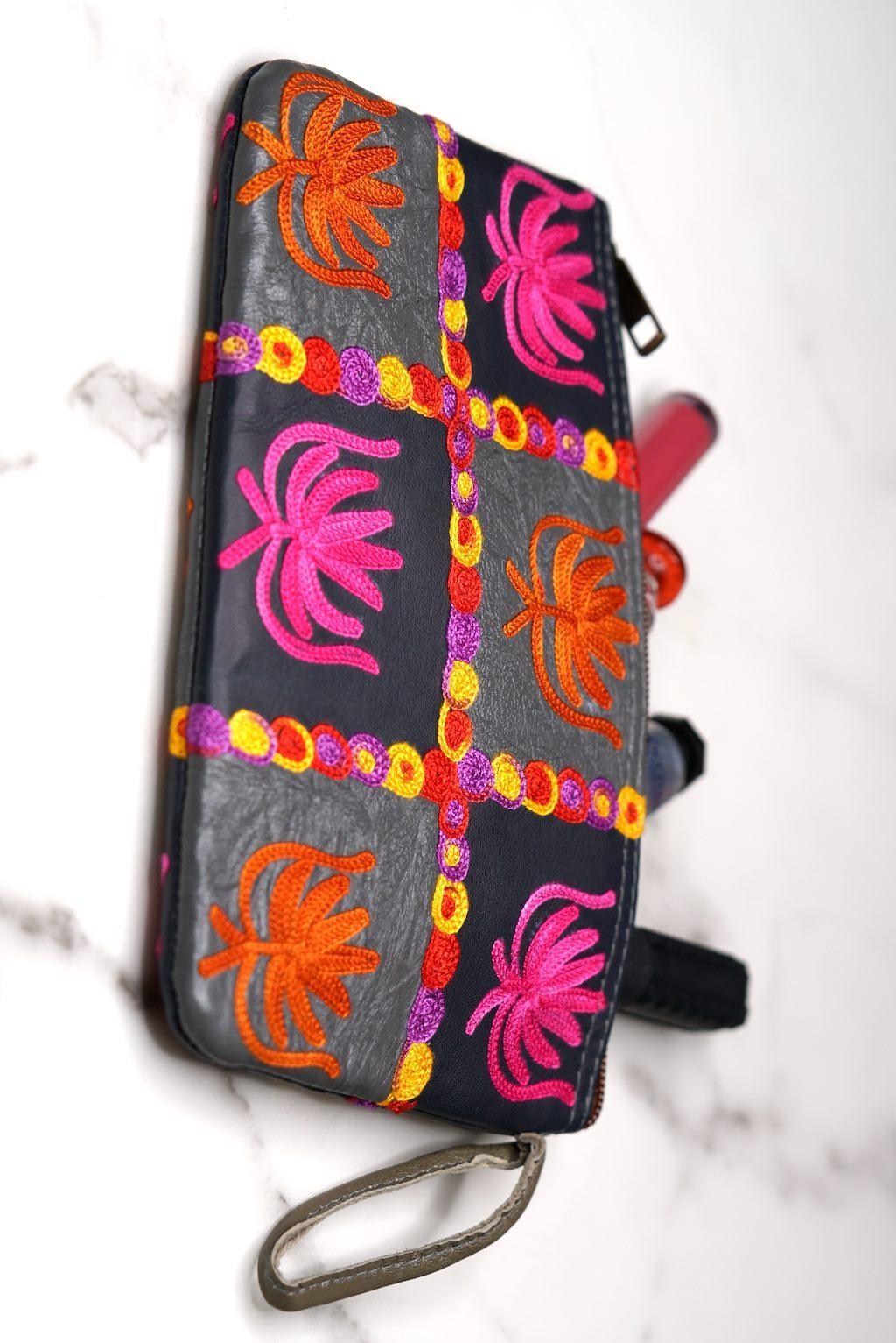 A stylist wristlet women purse for everyday use, handmade and kashmiri embroidery design for boho style. 