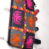 A stylist wristlet women purse for everyday use, handmade and kashmiri embroidery design for boho style. 