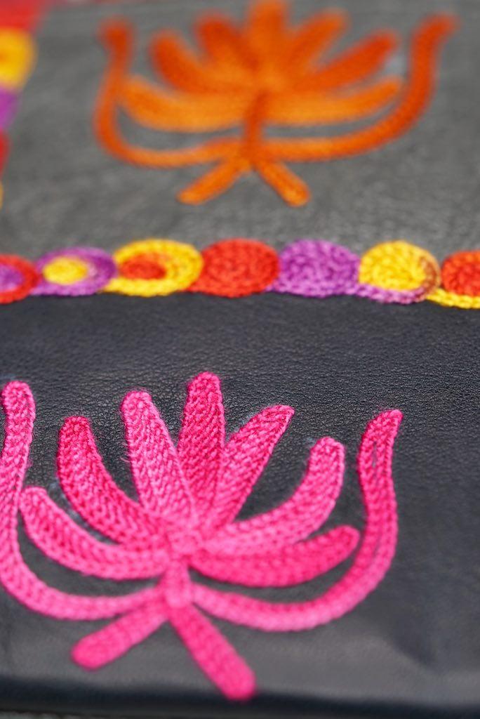 A stylist wristlet women purse for everyday use, handmade and kashmiri embroidery design for boho style. 