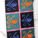 Unique style purse with cashmere handwork embroidery that comes with a wristlet and a secure zip top closure.