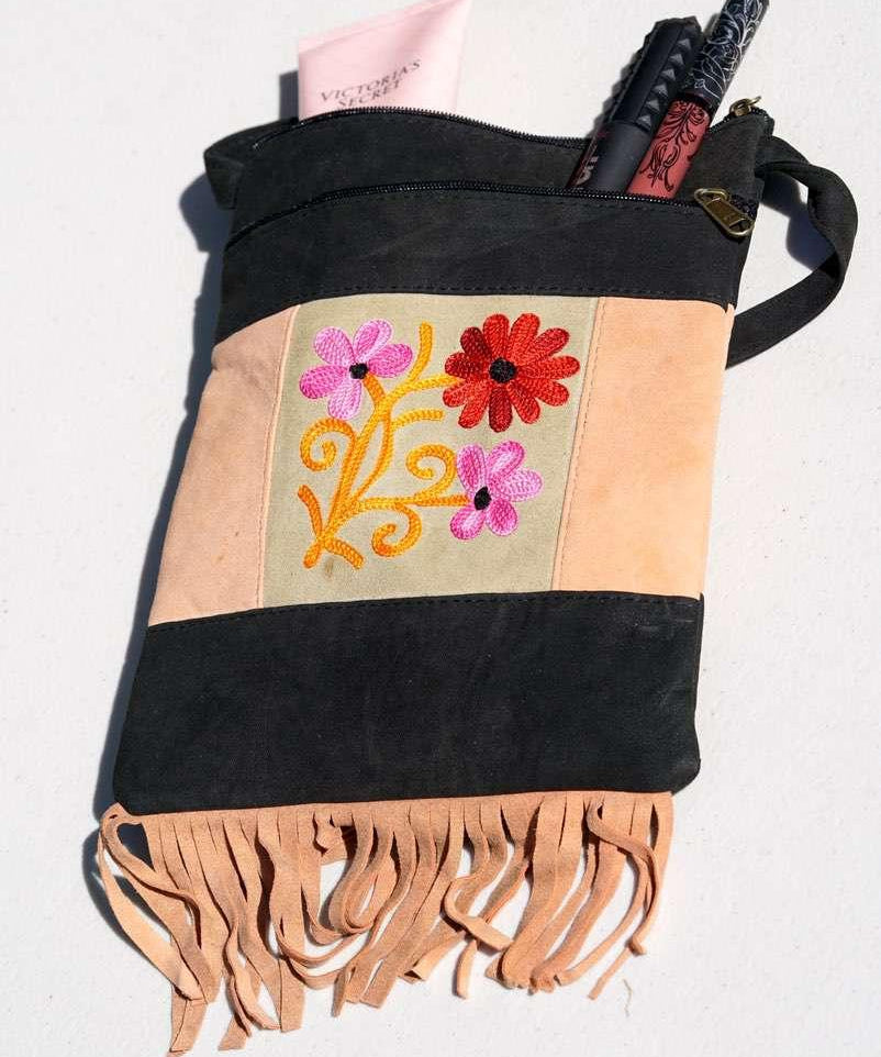 A unique style women's shoulder bag, crafted with beautiful cashmere floral embroidery to give it a chic stylish look..