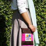 Easy to carry side bag for women, features a beautiful hand embroidered floral pattern. 