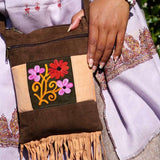 Absolutely stunning women's side bag with fringe/tassel to give you a bohemian chic look.