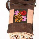 Absolutely stunning women's side bag with fringe/tassel to give you a bohemian chic look.