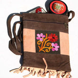 Absolutely stunning women's side bag with fringe/tassel to give you a bohemian chic look.