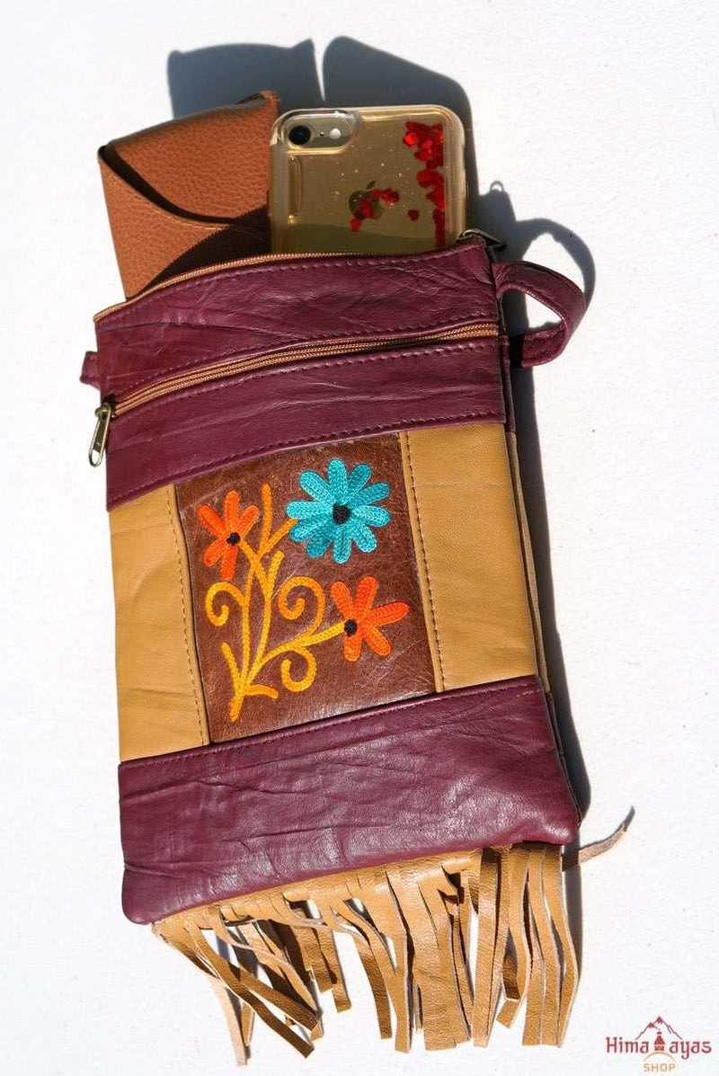 A unique style women's crossbody bag with fringe, crafted ethically from Himalayas.