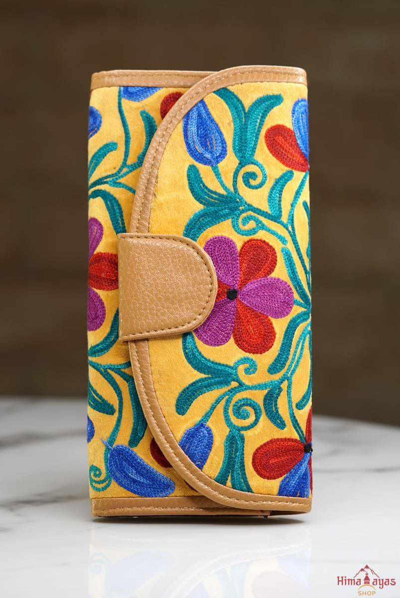  This stunning piece of handcrafted wallet is specially designed with Kashmiri style hand-embroidery. Perfect for everyday use, you can organize your money and cards perfectly in this wallet.