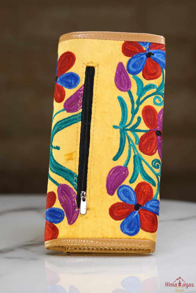  This stunning piece of handcrafted wallet is specially designed with Kashmiri style hand-embroidery. Perfect for everyday use, you can organize your money and cards perfectly in this wallet.