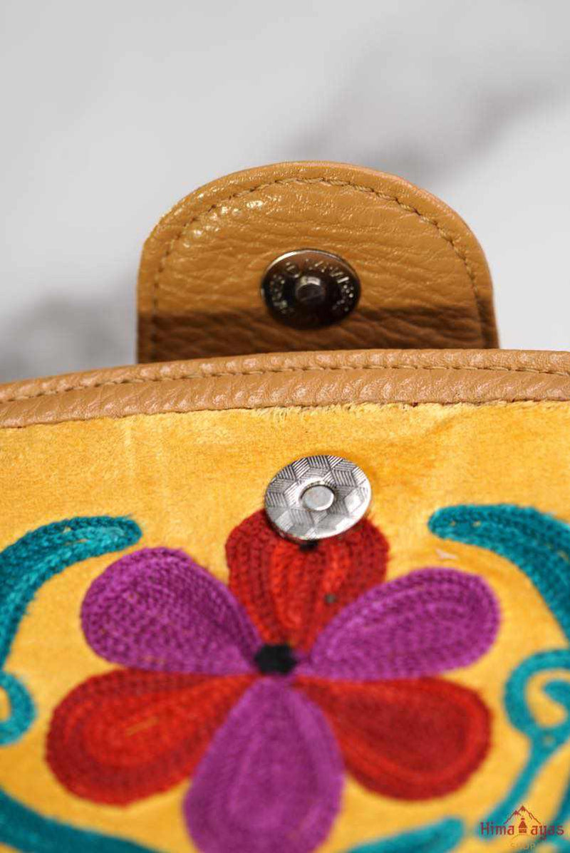  This stunning piece of handcrafted wallet is specially designed with Kashmiri style hand-embroidery. Perfect for everyday use, you can organize your money and cards perfectly in this wallet.