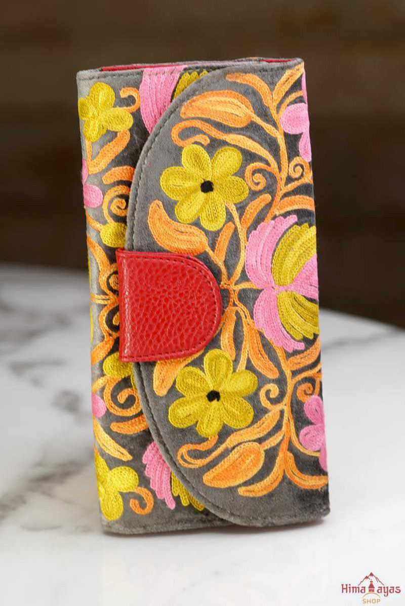 Everyday purse with beautiful handmade cashmere embroidery, lots of detailing and plenty of interior space make this wallet a must have . 