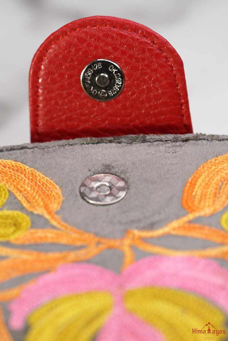 Everyday purse with beautiful handmade cashmere embroidery, lots of detailing and plenty of interior space make this wallet a must have . 