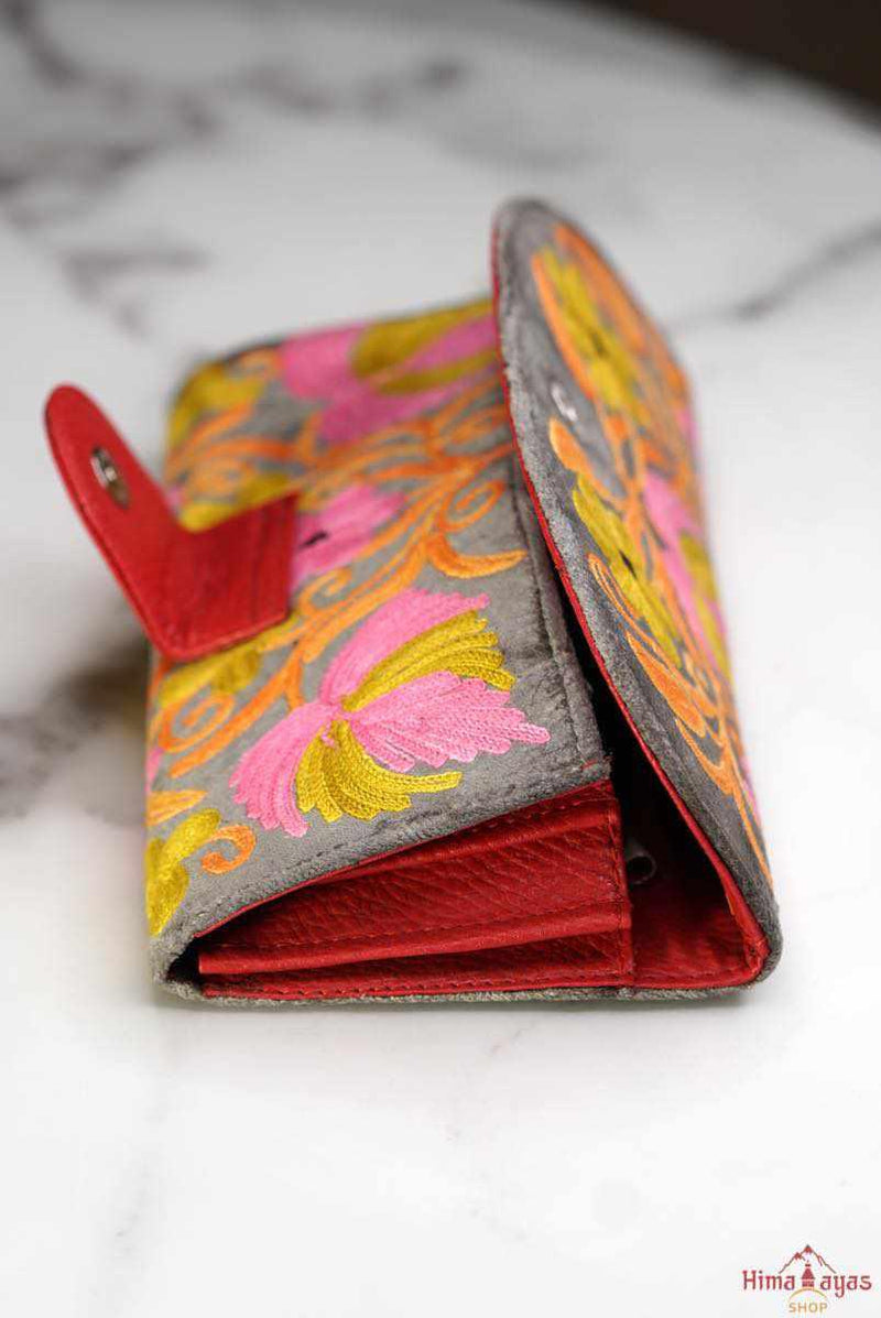 Everyday purse with beautiful handmade cashmere embroidery, lots of detailing and plenty of interior space make this wallet a must have . 