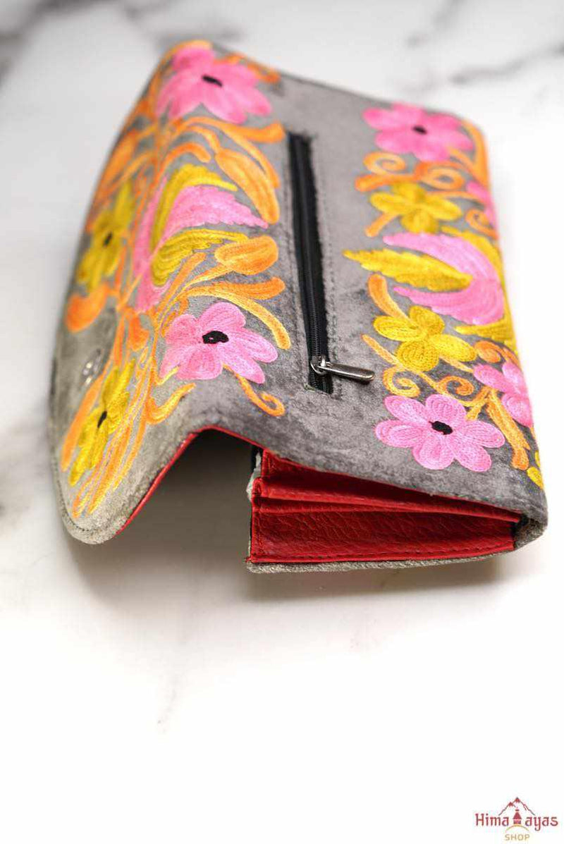 Everyday purse with beautiful handmade cashmere embroidery, lots of detailing and plenty of interior space make this wallet a must have . 